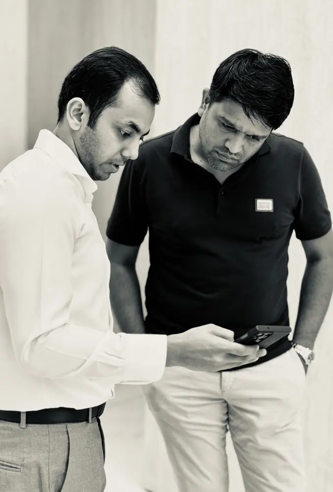 Two colleagues reviewing information together